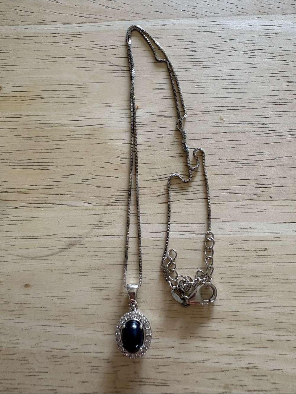 Silver Necklace with Dark Blue Oval London Topaz Pendant